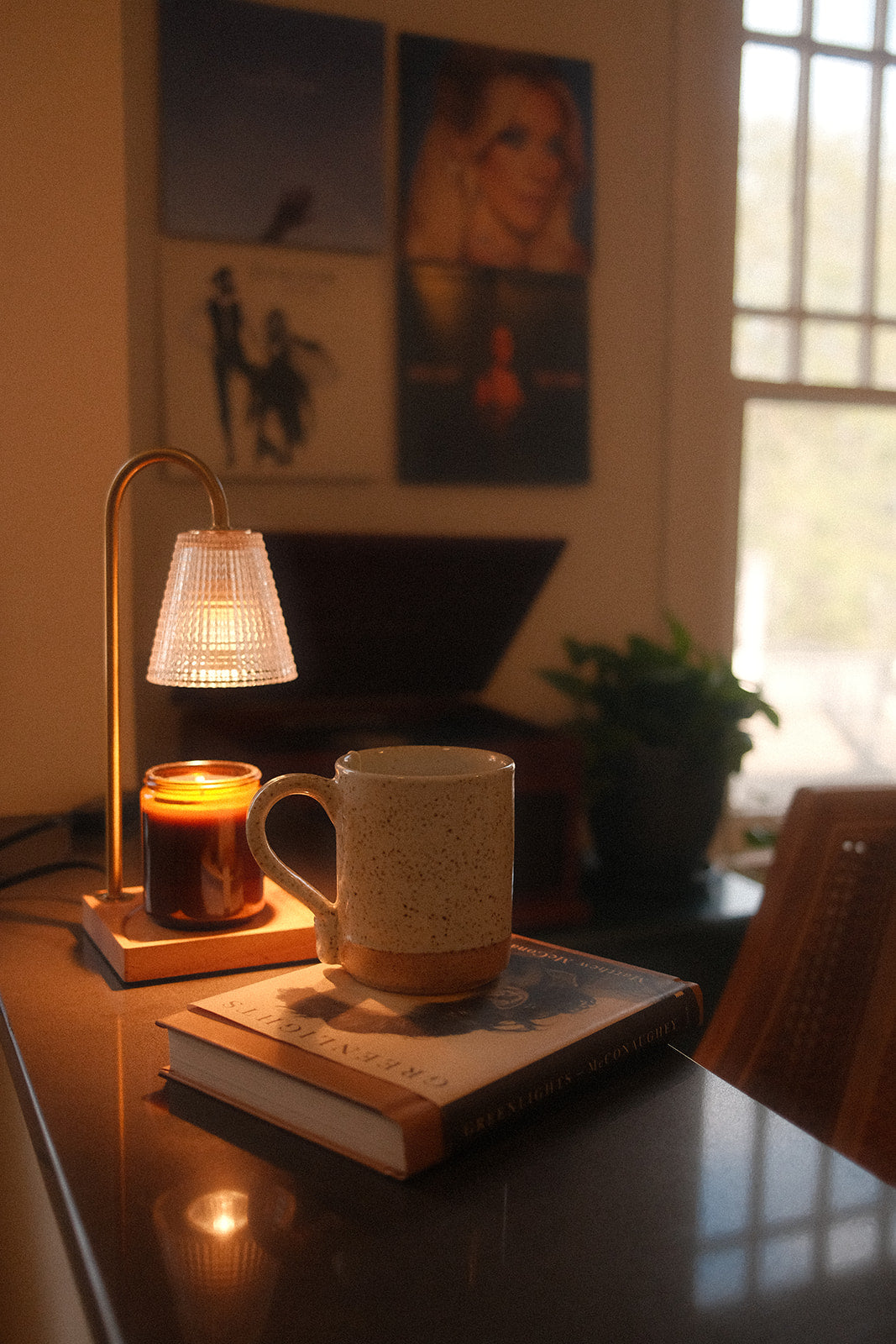 Doze Tea herbal tea mug with book and candle warmer for a cozy nighttime relaxation routine